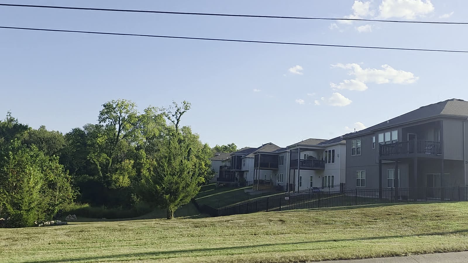 Two-story homes on a rise in Arbor Ridge, De Soto, Kansas