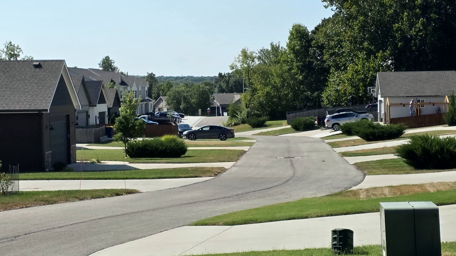 Newer two-story homes along a residential street in Possum Creek, De Soto, Kansas
